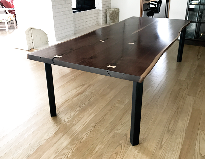 Custom slab top table, bookmatched walnut, steel base