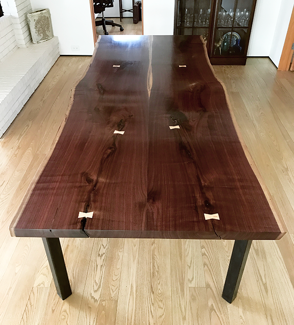 Custom slab top table, bookmatched walnut, steel base